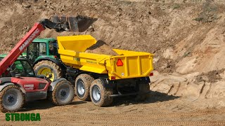 Stronga DumpLoada DL1000HP (Half Pipe) med en John Deere traktor Transport tung av sand