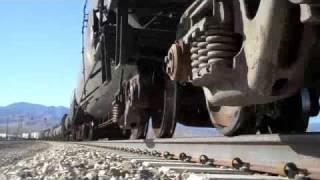 Train passes inches from the camera