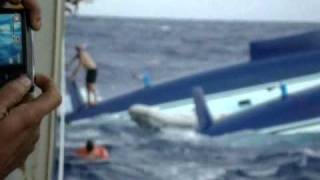 Capsized Atlantic 57 and Rescue by the M/V Forum Pacfic August  2010
