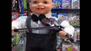 Scary violin-playing baby toy