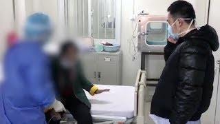 Elderly woman with COVID-19 decides to remain in Huoshenshan Hospital