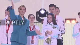 Russia: Fans greet ROC team as athletes return to Moscow after Beijing Olympics