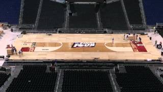 Watch as crews build the NCAA Final Four floor at Lucas Oil Stadium