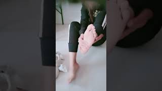 Chinese girl sprains her ankle in white socks