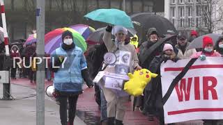 Germany: Protesters march in Saarbrucken against COVID restrix