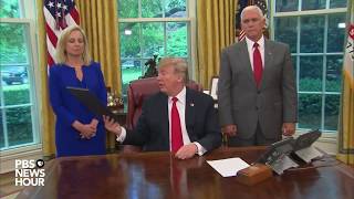 WATCH: Trump signs executive order to keep families together at border