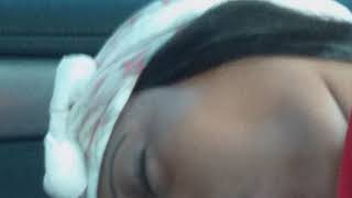 My sister sleeping in the car and this is what happened she was..........