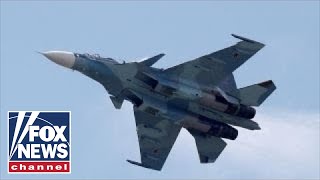 Russian fighter jet buzzes US spy plane