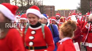 UK: Sea of Santas fill streets of Liverpool for Santa Dash