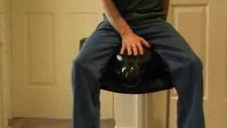 Black balloon sit and pop
