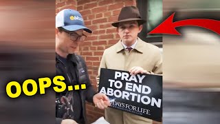 Camera Catches The Moment Awkward Protestor Realizes He's Getting Trolled