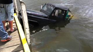 Man looses car and trailer at boat ramp & is lucky to escape injury.
