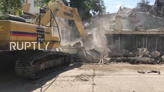 Haiti: Heavy machinery clear debris in Les Cayes following deadly earthquake