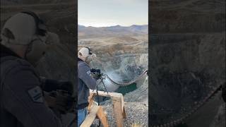 Shooting PKM tracer rounds into my grandpas lake