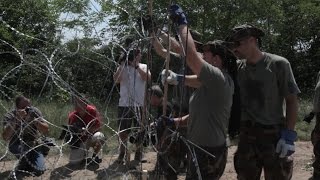 Barbed wire greets migrants fleeing to Europe