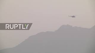 Afghanistan: Planes and helicopters fly over Kabul with shots heard amid evacuation efforts