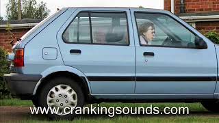 Woman cranking her Nissan Micra - Cranking / Pedal Pumping
