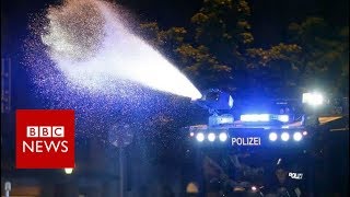 Riot police disperse G20 protesters - BBC News