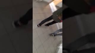 Young skater teen sagger in VANS and skinny jeans candid