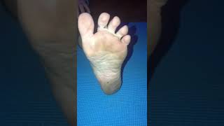 Candid foot poses while stretching
