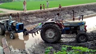 Tractor Pulling through canal mud in Punjab