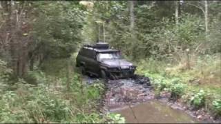 Landcruiser HJ61 and Patrol GR in mud