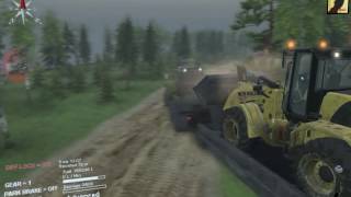 Spintires 03.03.16 loading a tractor on a flat bed trailer