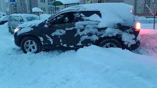 Kia Sorento выезжает из сугроба