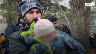Polish border forces deploy tear gas as migrants attempt to break through fence