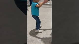 Afghan refugee children and US soldiers dance together in Qatar