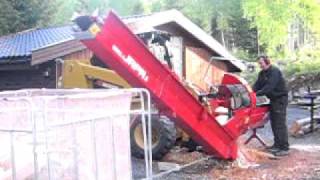 Skid steer making easy and fast firewood