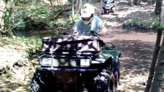 ATVs cross water