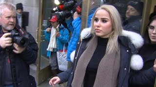 Woman charged in chair toss incident makes court appearance