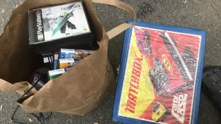 Taking eBay packages to the post office going through some toys and video games bought at Yard sales