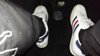 Car cranking and revving in sneakers