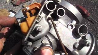 How to adjust motorcycle carburetor floats.
