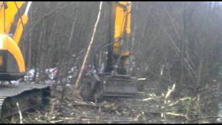 Мульчер на базе экскаватора JCB