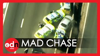 Speeding Driver Smashes FOUR Police Cars During Mad Motorway Chase