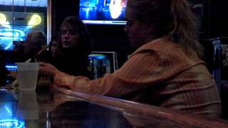 Drunk girl eats dollar bill at bar