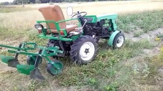 Мототрактор. Окучивание картошки конными окучниками.