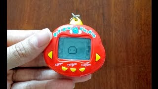 Tamagotchi - Rakuraku Dinokun - Bichinho Virtual - Dinkie Dino - Virtual Pet