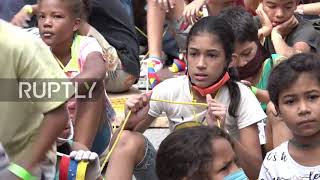 Children whizz downhill for annual 'carruchas' race in Caracas