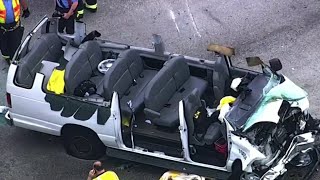 Crews cut roof off van after crash near Millenia