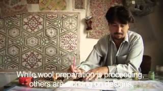 Making a hand-knotted wool rug in Afghanistan