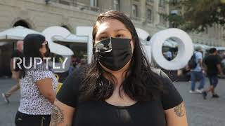 Chile: 'Partly happy and partly sad' - Santiago residents react to Boric presidential victory