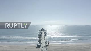 USA: Workers continue to remove oil spill remains from Southern California coast