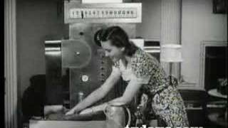 BOOMER WIFE WITH ROBOT AT HOME 1946