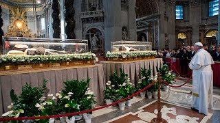 Pope Francis prays near relics of Saint Pio