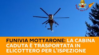 Funivia #Mottarone: la cabina caduta è trasportata in elicottero per l'ispezione