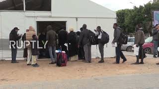Libya: Sudanese migrants arrive at Tripoli airport ahead of repatriation flight